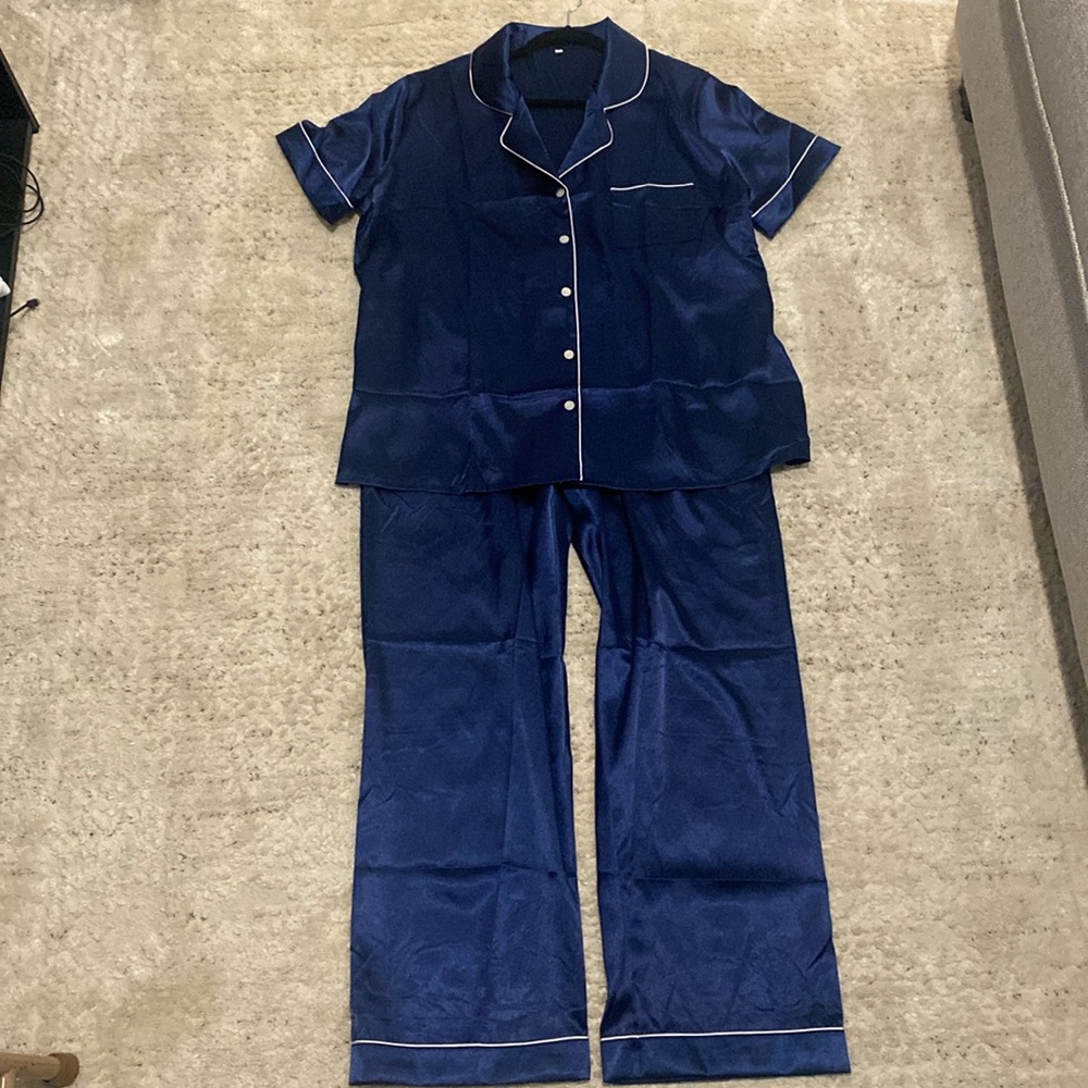 NEVER WORN! Blue satin pj set. Short sleeves.